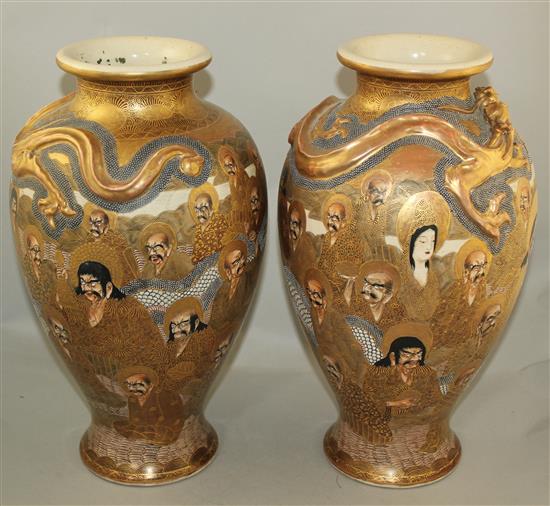 A pair of Japanese Satsuma pottery baluster vases, Meiji period, signed Hodota, 38.5cm